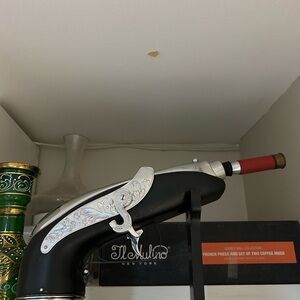 Antique wine holder that plays music !